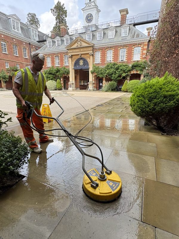 operative pressure washing college grounds